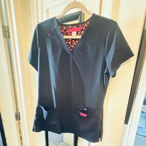 koi Navy Short Sleeve V-Neck Scrub Top with Pink Accent. Unworn